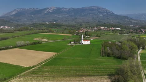 aerial view of our lady of consolation pilgrimage church in log pri vipavi, vipava valley, slovenia