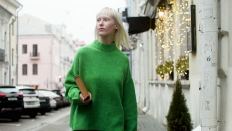 Young-girl-walking-in-the-street