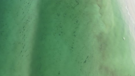 Aerial-view-of-the-ocean-between-the-beach-and-the-sandbar