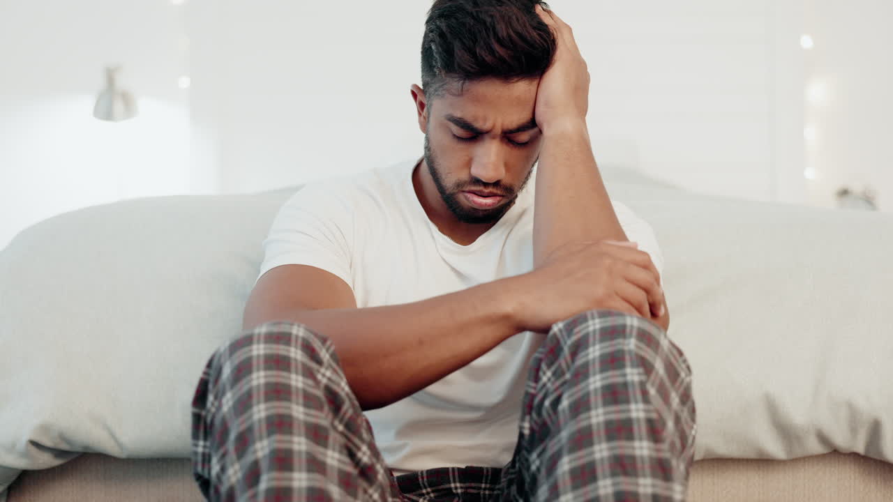 Depression, phone and mad with man in bedroom