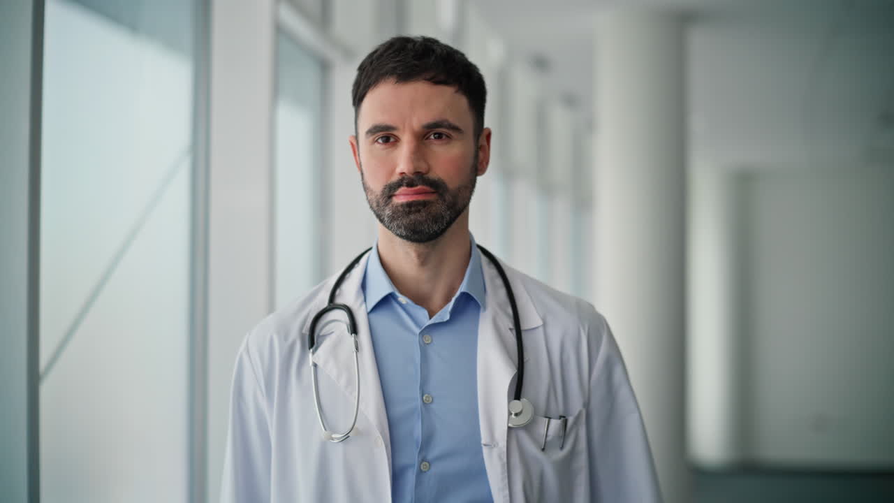 Portrait serious medical worker posing in hospital. Healthcare professional
