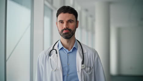 portrait serious medical worker posing in hospital. healthcare professional