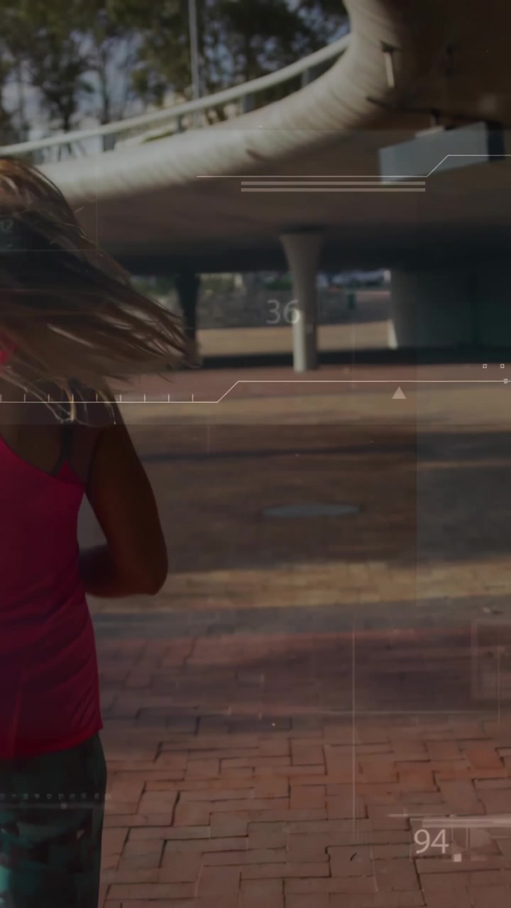 Vertical video: Runner jogging into brick plaza, activating HUD around runner showing fitness data