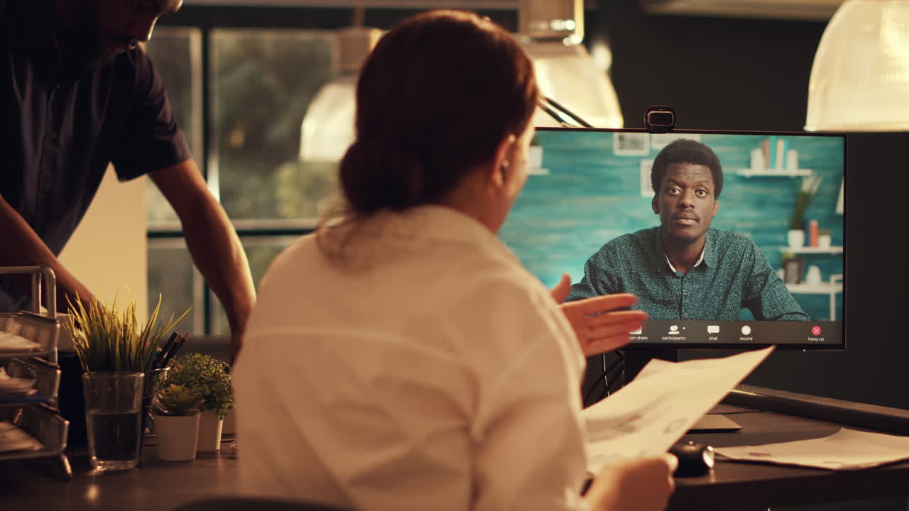 Young adult meeting with man on online videocall connection