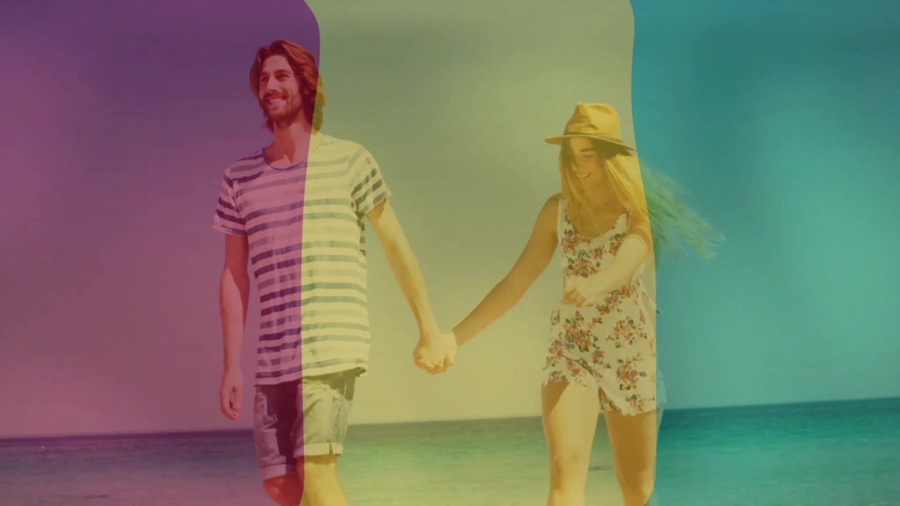 Travel ad showing color bands shifting, revealing couple holding hands walking along shore