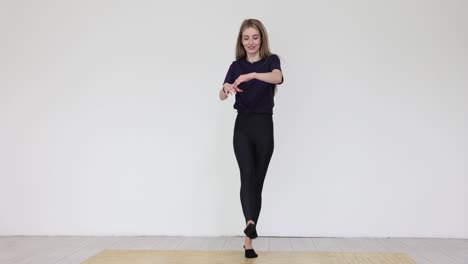 young woman exercising indoors