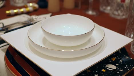 white square plate and bowl table setting