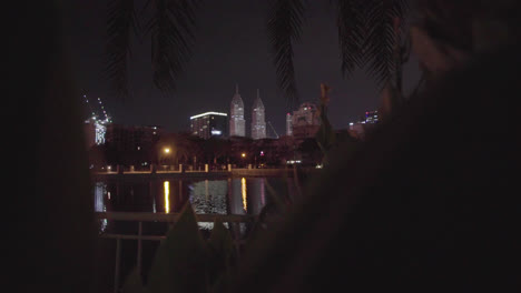 dubai city with buildings and futuristic architecture at night