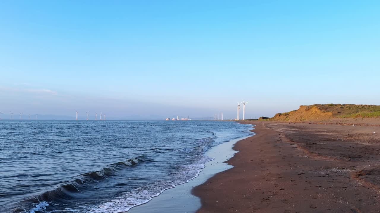 Empty beach and sea at Otaru Dream Beach, calm sunset, peaceful coastal mood