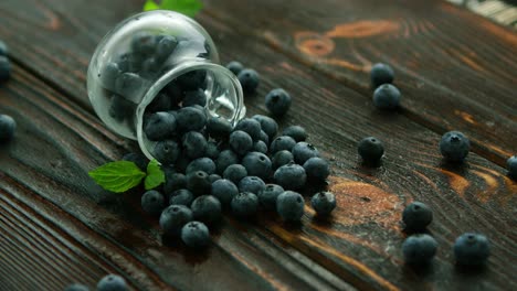 Blueberry-scattering-from-glass-jug