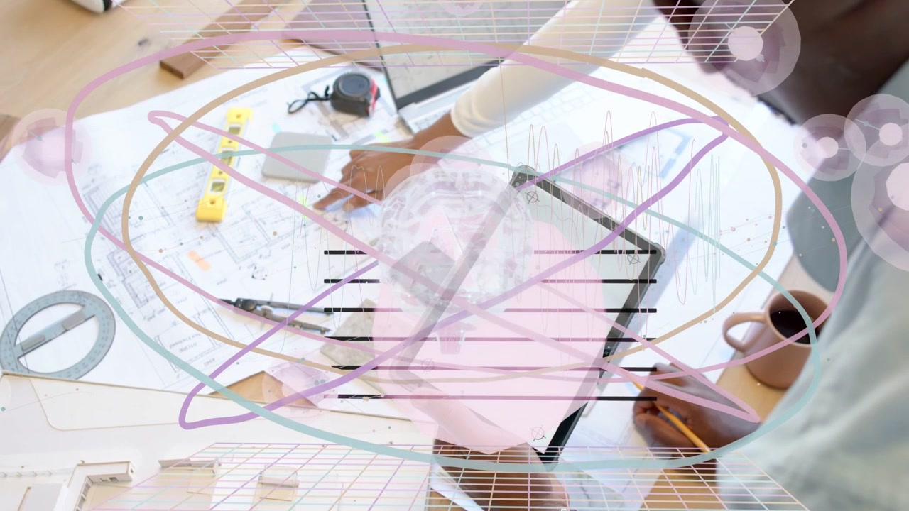 Designers reaching, adjusting plans on laptop for review, pencil and mug near, overlay over plans