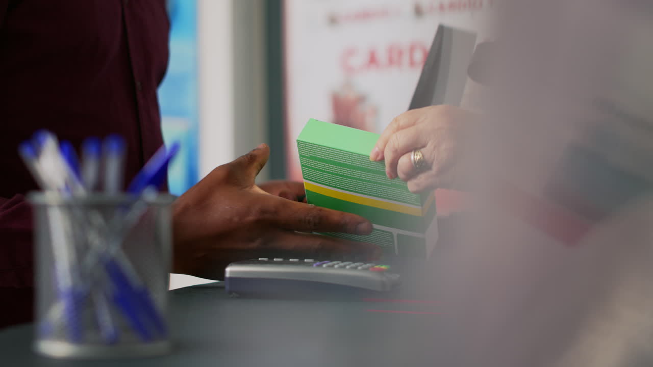 A person uses a POS terminal to make a purchase