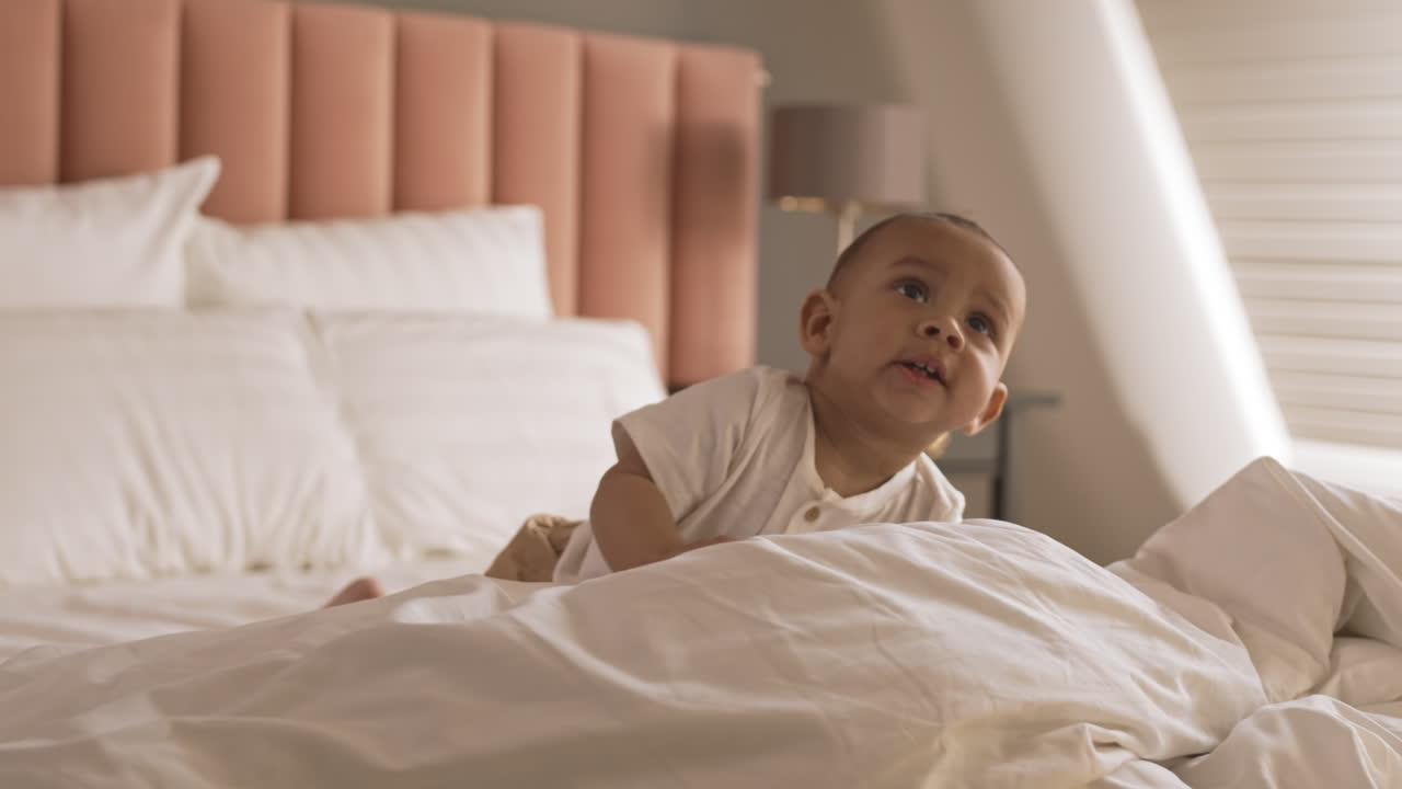 Baby Crawling in Bed