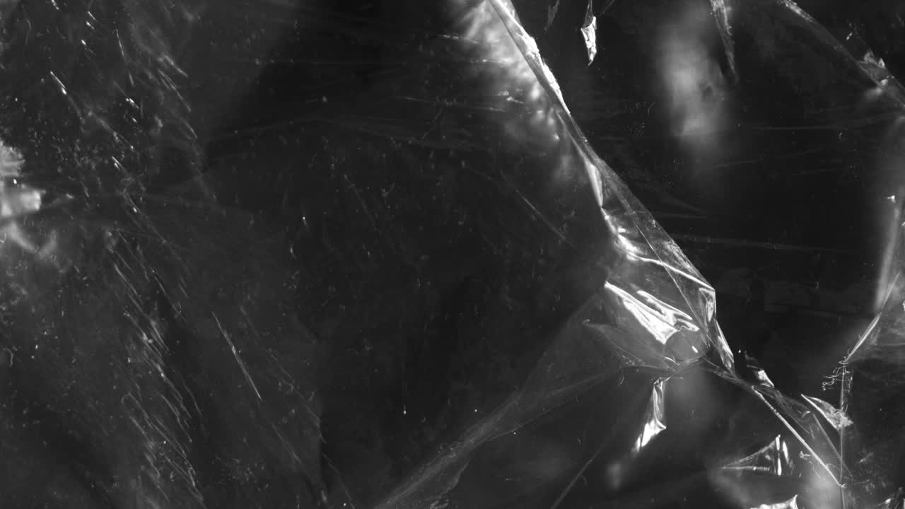 fondo de papel de aluminio blanco y negro abstracto. animación en stop motion. loop vj. animación para escenas, discotecas, conciertos, ceremonias, videos musicales