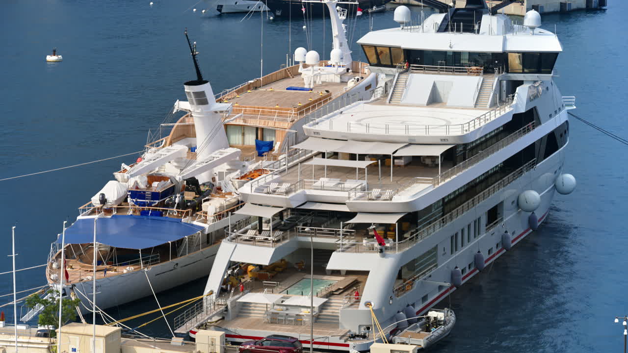 View of white yacht docked in the Monaco Marina