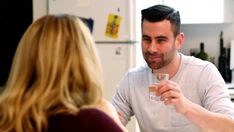 Couple-having-breakfast-at-home