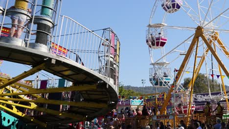 vibrant fair scene with rotating ferris wheel