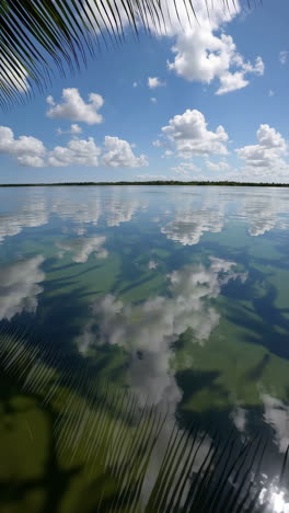 tranquil lagoon with cloud reflections