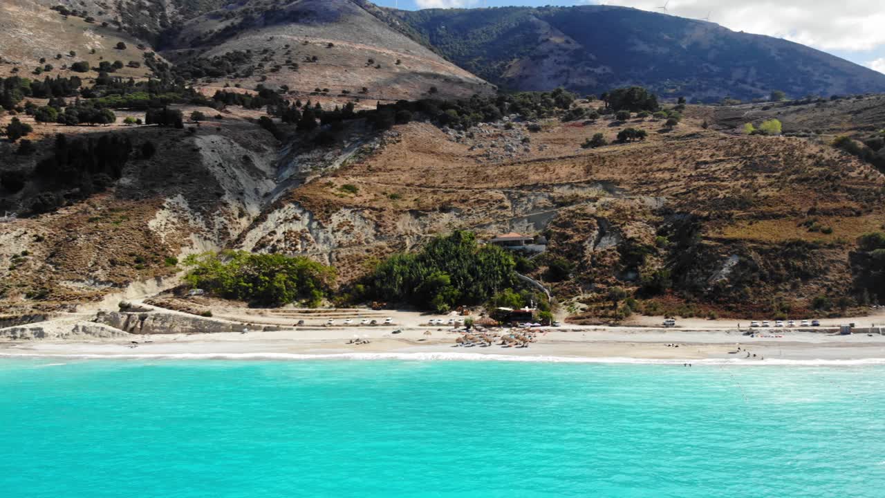 Pristine Blue Water And Rugged Terrain Of Agia Kiriaki Beach In Kefalonia, Greece