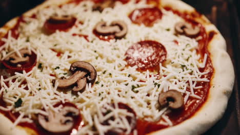 close-up of a pepperoni and mushroom pizza