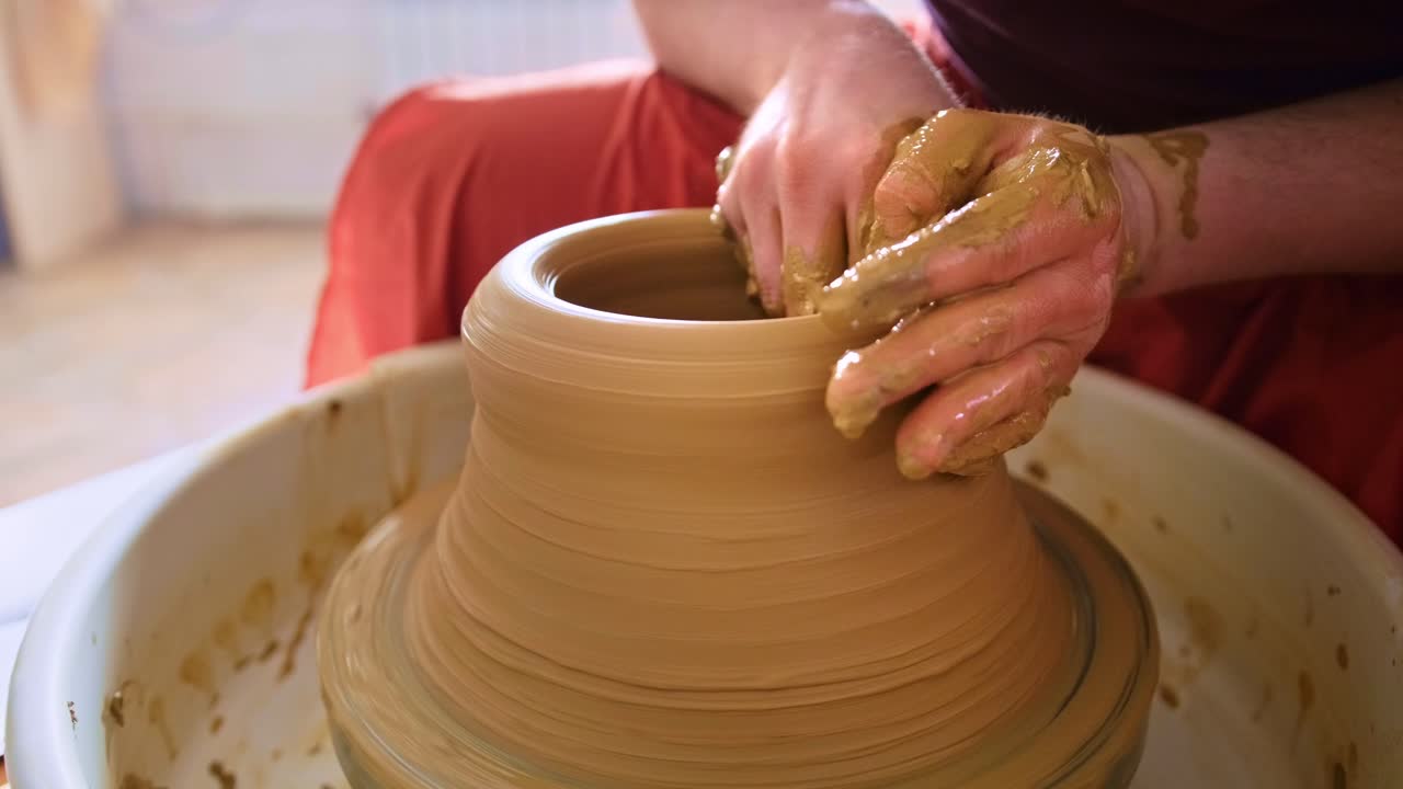 Artistry in Clay: A Skilled Pottery Session Capturing the Creation of a Beautiful Ceramic Vessel from Beginning to End
