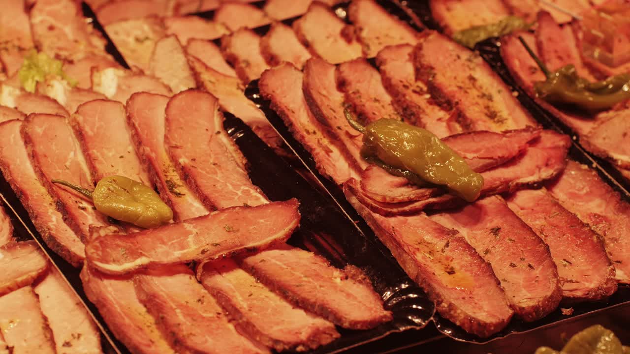 Indulge in mouthwatering thicksliced bacon topped with green peppers a savory delight for food enthusiasts