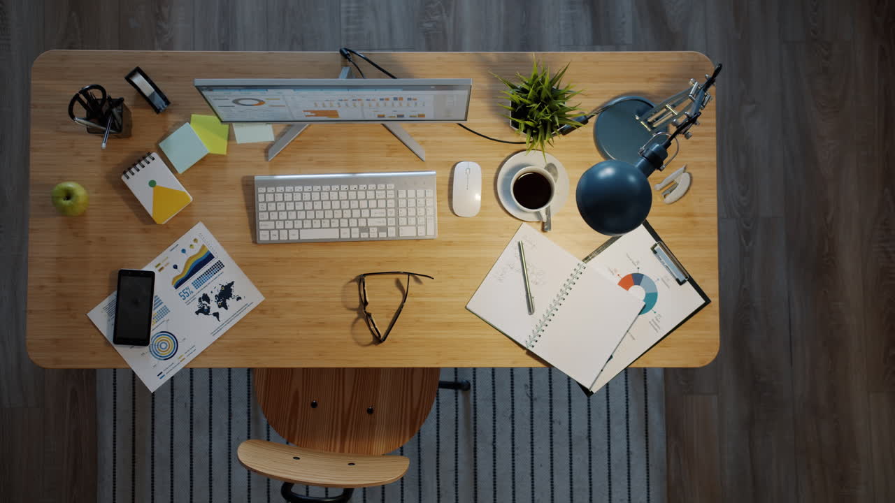 Organized Home Office Desk with Laptop and Documents