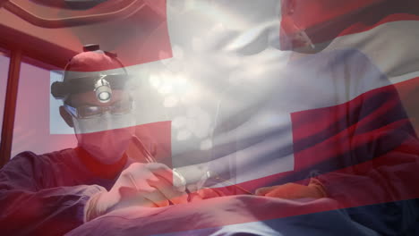 animation of flag of switzerland waving over surgeons in operating theatre