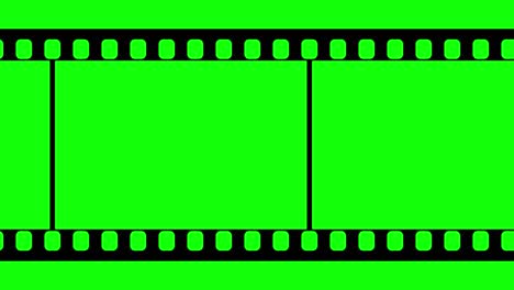 una tira de película de 35 mm que se mueve en un fondo de pantalla verde. imágenes de video en bucle sin problemas en una pantalla blanca. plantilla de diseño de tira de película abstracta.