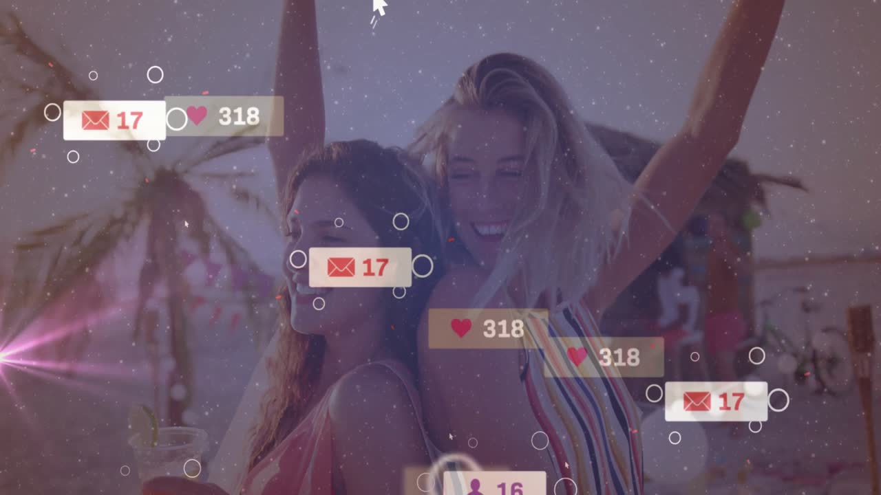 To venner danser på terrasse ved solnedgang, løfter smartphone og fejrer stigende ikoner for sociale medier.