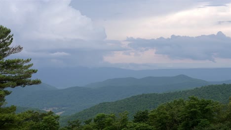 Static-shot-capturing-a-panoramic-view-of-lush,-green-hills-stretching-into-the-distance