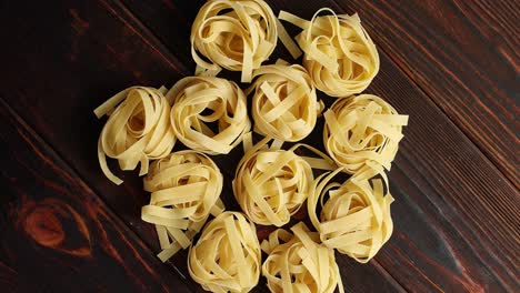 Bunches-of-raw-pasta-on-table