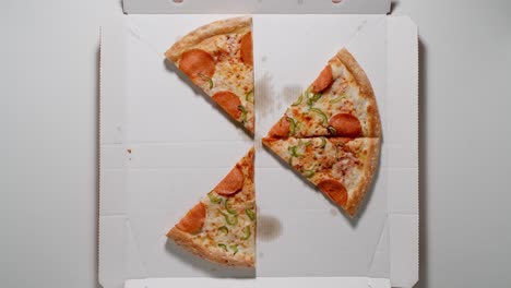 circle of pizza is eaten up from the papper box