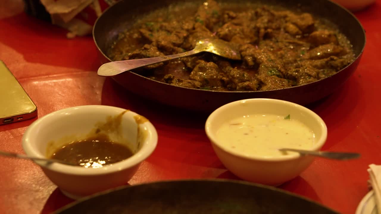 Chicken Karahi - traditional recipe of Lamb's Meat made with its own fat, tomatoes, green chilies and some ginger