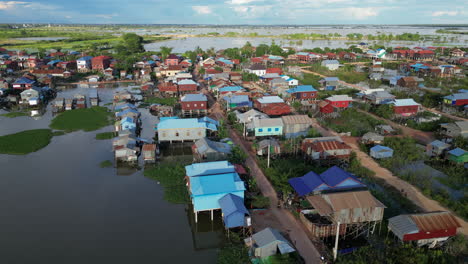 houses constructed on stilts sit above the cambodian floodplain at phnom krom