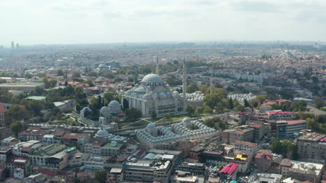 Mosque-on-a-Hill-in-Istanbul-with-clear-Sky-and-Impressive-Architecture,-Scenic-Aerial-Wide-View-from-above
