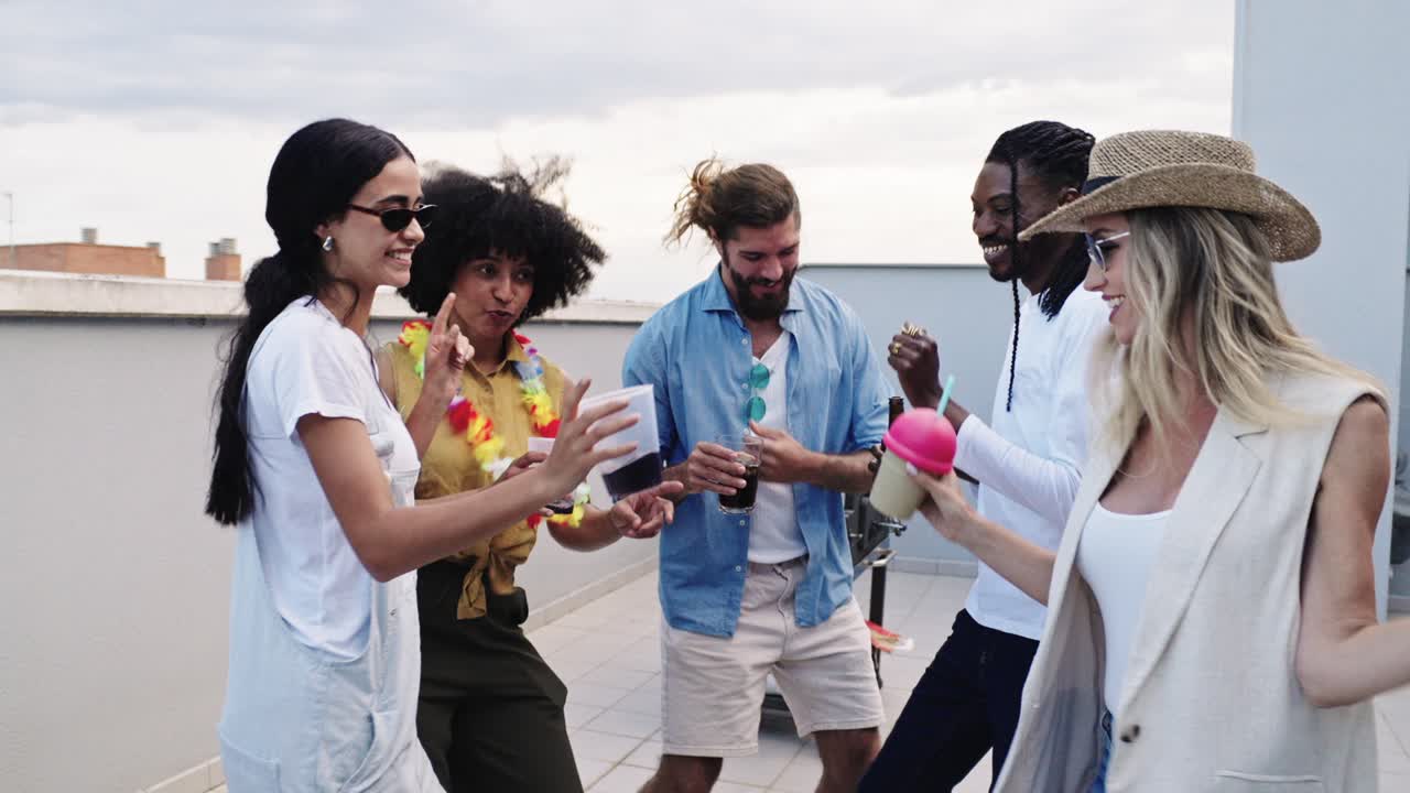 Group of friends having a rooftop party