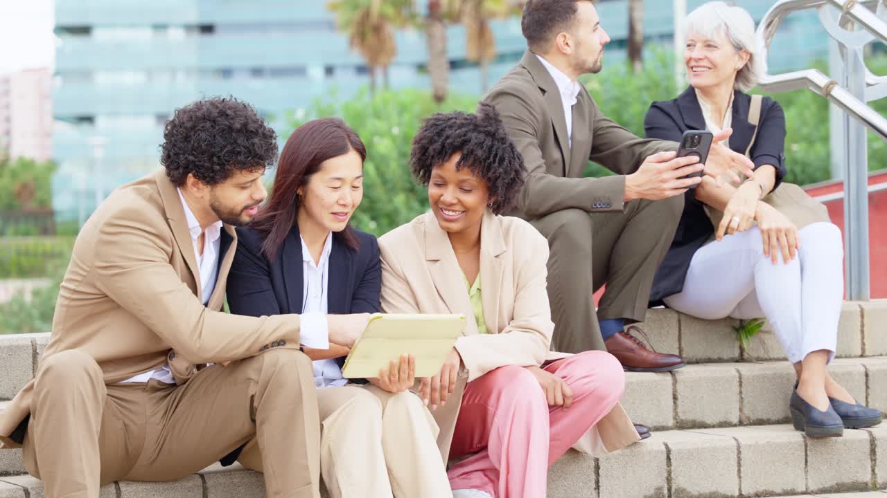 Business team collaborating outdoors