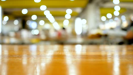 wood floor with out of focus bokeh blur abstract background shallow depth of field with copy space for insert product or text