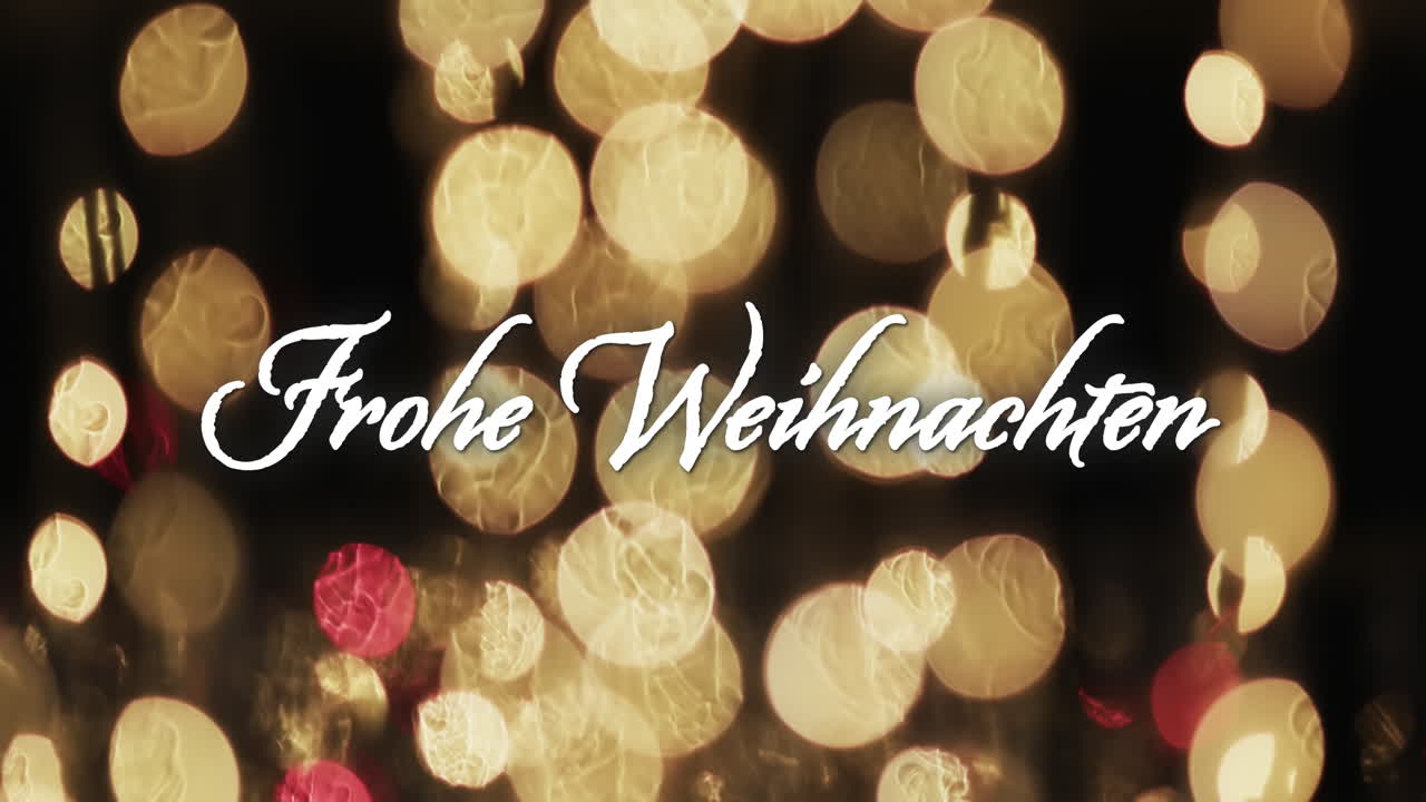 Animation des Textes 'Frohe Weihnachten' über einem Hintergrund mit gelben Lichtflecken.