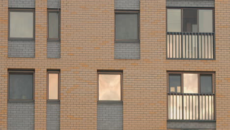 modern brick apartment building facade