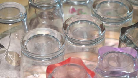 close-up of various glass cups inverted for drying