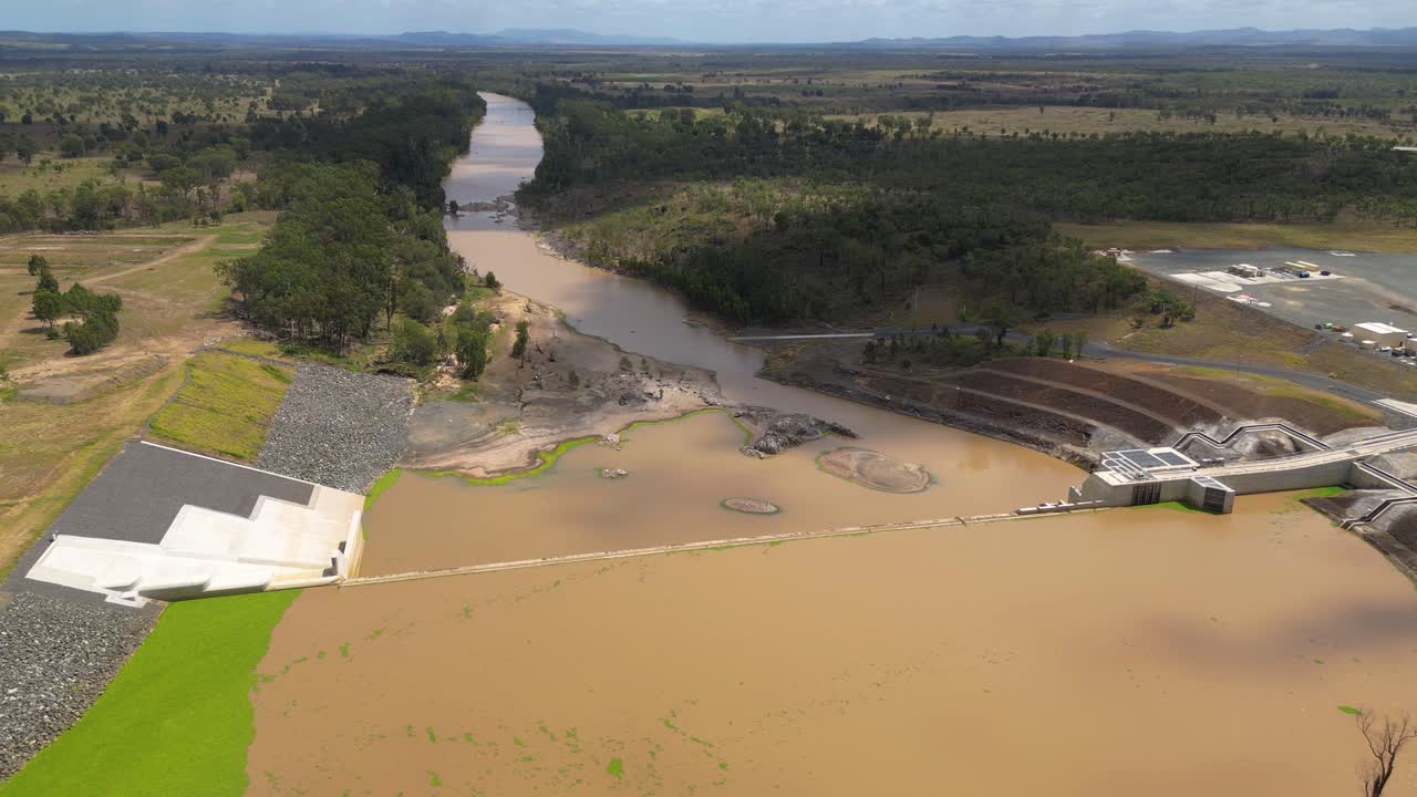 Left to right aerial views over Rookwood Weir and the Fitzroy River, West of Rockhampton, Central Queensland, Australia.