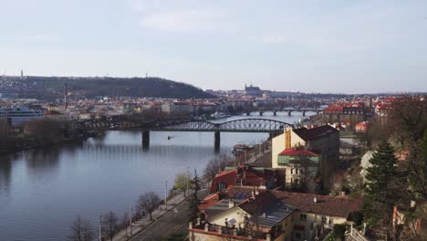 beautiful view of whole prague city from upper castle, vltava river and bridges in spring colors, static long shot