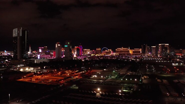 Wide panning aerial shot of the central Las Vegas Strip at night