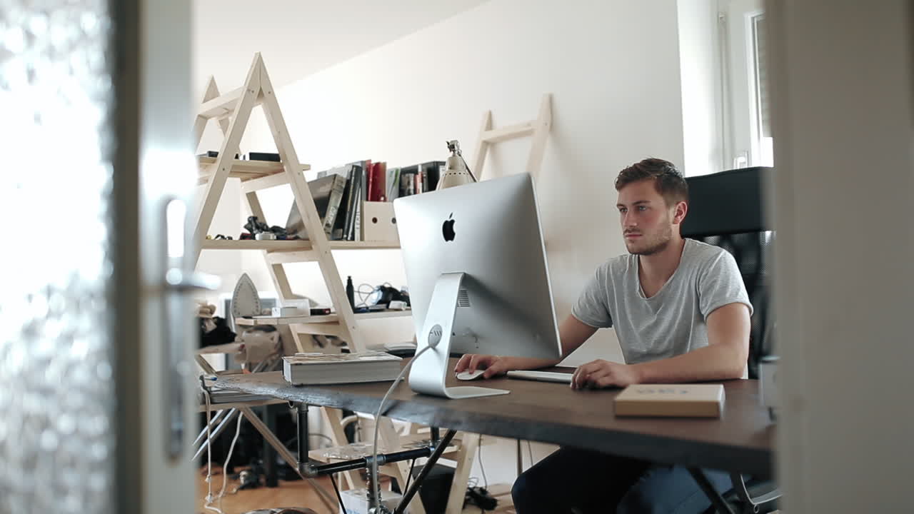 Man Working at His Home Office