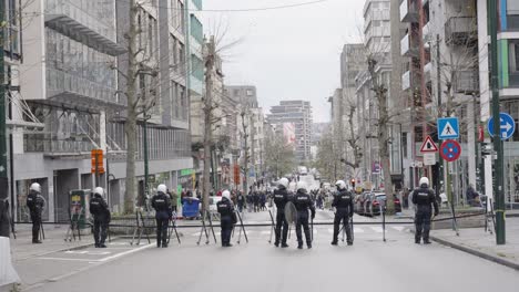 the riot police holding the ground during riots, protests in brussels, belgium