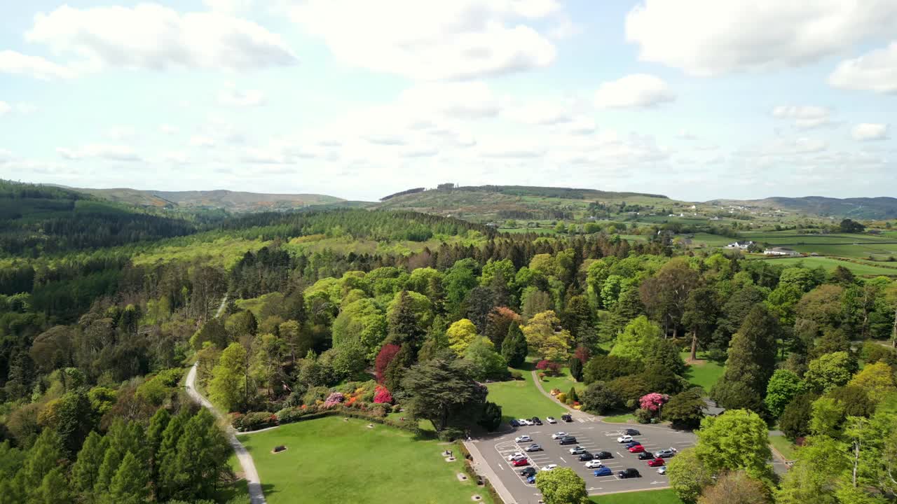 Wide, slow moving video of the Mourne Mountains and Slieve Donard in Newcastle, County Down in Northern Ireland, UK on a bright and sunny day. Filmed in 4K, 60fps and with Rec709 Color.