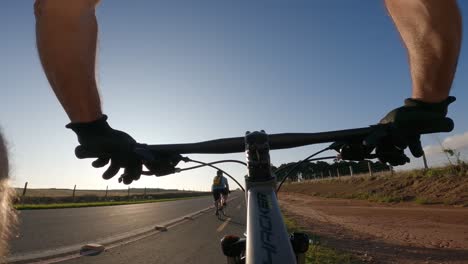 cyclists on the signposted cycle path, point of view shot