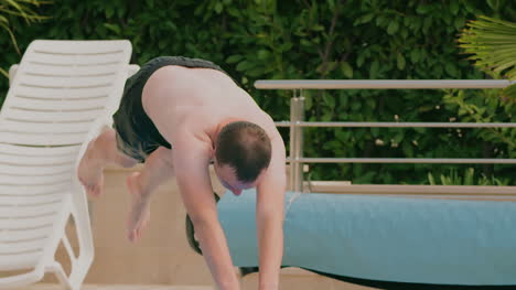 man jumping into swimming pool 4